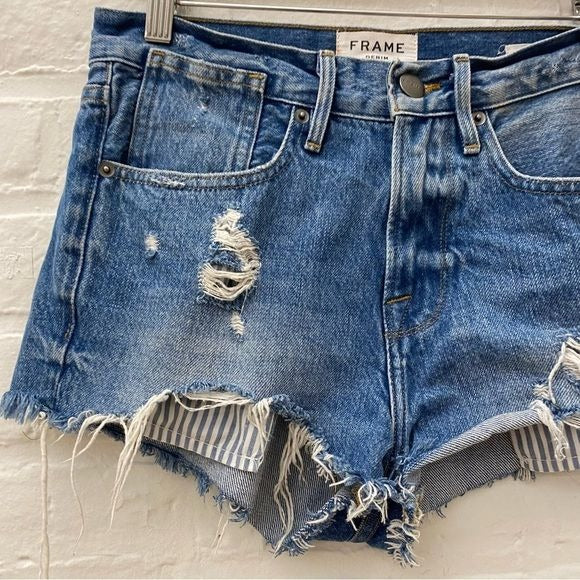 Frame || Le Stevie Distressed Denim Cutoff Shorts with Peeking Pockets Blue 24