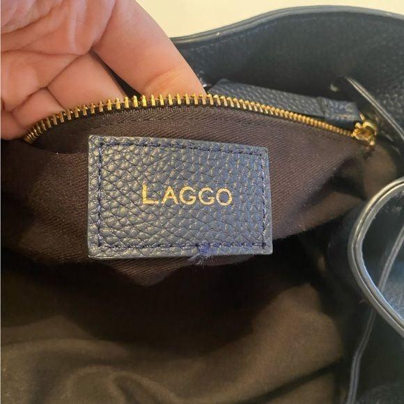 LAGGO || Andrea Tassel Drawstring Hobo Bag Pockets Pebbled Leather Navy