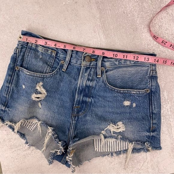 Frame || Le Stevie Distressed Denim Cutoff Shorts with Peeking Pockets Blue 24