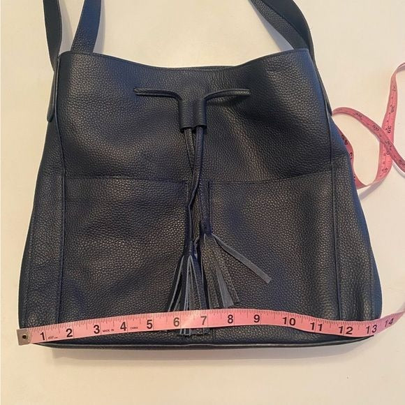 LAGGO || Andrea Tassel Drawstring Hobo Bag Pockets Pebbled Leather Navy